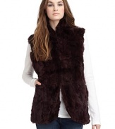 THE LOOKStand-up collarFront hook and eye closureSleevelessFront slash pocketsTHE FITAbout 26 from shoulder to hemTHE MATERIALDyed rex rabbit furFully linedCARE & ORIGINDry clean by fur specialistImportedFur origin: China