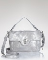 This distressed leather shoulder bag from Juicy Couture is ready to shine. A silvery finish is in step with the metallic trend, while its detachable shoulder strap ensures round the clock versatility.