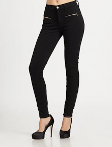 Unique pockets, zippered cuffs and a hint of stretch make these unbelievably soft, mid-rise skinnies a perfect day-to-night option. THE FITMedium rise, about 9Inseam, about 29THE DETAILSZip flyFront besom pocketsZippered front slash pocketsBack patch pocketsZippered cuffs69% rayon/25% nylon/6% spandexMachine washMade in USA of imported fabricModel shown is 5'9 (175cm) wearing US size 0.