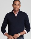 Add refinement to your wardrobe with this super-soft sweater rendered in pure merino wool and furnished with a half zip front for masculine appeal. Layer a colorful or patterned button-down underneath to express your classic style.