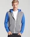 Color-blocking lends on-trend appeal to this zip hoodie from Alternative.