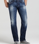 Diesel's Safado jeans cut a clean silhouette with a slim fit and straight leg. Distressing and fading add worn-in edge.