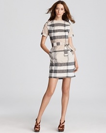 A youthful take on the brand's signature check, this Burberry Brit dress pairs a high hemline with a flattering tie-waist for a wardrobe addition that will go from desk to drinks with ease.