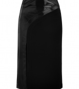 This mixed media pencil skirt from fashion-forward London brand Hakaan features an asymmetric shiny panel and a figure-hugging fit - High waist, shiny asymmetric panel, front slit, pencil silhouette, concealed back zip closure - Pair with an edgy silk blouse and sky-high platforms