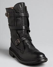 Burberry lends its sophisticated British polish to these moto boots, put together with sleekly styled hardware and straps.