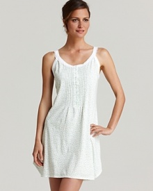 A sleeveless knit gown with intricate lace trim, a pretty style from Eileen West.