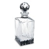 Roundly respected for its history of craftsmanship, Reed & Barton preserves its old-world heritage with sparkling designs that glimpse the future, as with the brilliantly contemporary cutting on this shimmering square decanter.