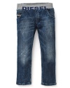 Denim meet sweats in these super-cool Diesel jeans featuring an elastic logo waistband for added laid-back comfort.