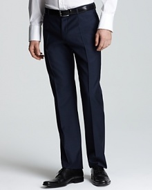 A dapper pair of dress pants from HUGO sets the tone for a strong, professional look and a productive day.