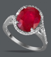 Crimson royale. Effy Collection's stunning ring features an oval-cut ruby (5 ct. t.w.) surrounded by a seamless row of round-cut diamonds (1/4 ct. t.w.). Set in 14k white gold.