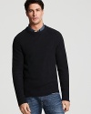 Crafted in a soft wool and cotton blend, this cozy crewneck is accented with leather elbow patches for that sexy professor look.