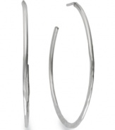 A trendy take on a traditional design. Studio Silver's open hammered hoop earrings are a must for every contemporary woman's collection. Crafted in sterling silver. Approximate diameter: 2 inches.