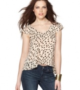 Feminine and altogether sultry, BCBGeneration lightens up a classic animal print top!