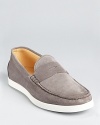 Penny loafers rendered in quality suede and updated with modern, sporty details for a wear-anywhere casual shoe.