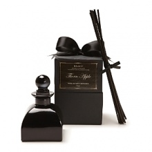 The fragrance for this D.L. & Co. diffuser set contains an verdant blend of apple wood, patchouli and oak moss. The set features scented oil, a glass diffuser decanter, diffuser reeds and an exquisite black ribboned box for the perfect gift.