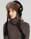 Soft faux fur lines Nobis' warm, wooly cap, trimmed with braids, buttons and tassels.