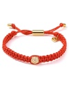 Tie on bold style with this wrap bracelet from MICHAEL Michael Kors. Crafted from woven cord and accented by a fireball station, it perfects effortless glamor.