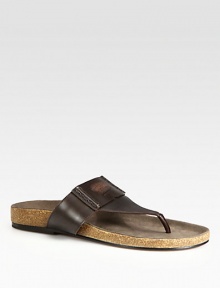 Thong sandal with embossed iconic logo detail.Leather upperRubber soleMade in Italy