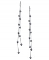 Fire up your evening with these two-row linear earrings from GUESS. Crystal-embellished fireballs hang from metal chains. Crafted in imitation rhodium tone mixed metal. Approximate drop: 7 inches.