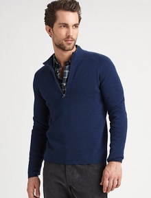 A sleek, knit pullover made from Italian extra-fine wool.Stand collarLong sleevesZipper placketPull-on styleWoolDry cleanImported of Italian fabric