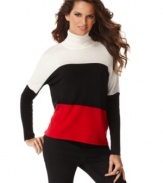 Colorblocking takes INC's turtleneck sweater to a whole new level! A touch of cashmere adds extra softness, too.