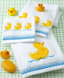 Make way for ducks! These soft cotton hand towels with cheerful duck appliqués add a splash of fun to the bathroom.