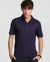 The classic fit polo from Michael Kors, accented with metallic buttons at the placket and left chest pocket.