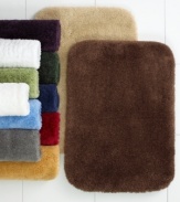 Classic comfort. Plush, Comforel nylon provides a sweet retreat for your feet in this sumptuously soft Charter Club contour bath rug. Choose from a lush array of bleach-and-stain resistant hues.