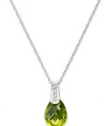 Take your look to the next level with the right amount of color. A pear-cut peridot (2-1/5 ct. t.w.) adds the sparkle to this shining 14k white gold necklace with diamond accents at the bail. Approximate length: 18 inches. Approximate drop: 1/2 inch.