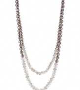 Classic elegance. This two-row necklace from Kenneth Cole New York is crafted from silver-tone mixed metal with taupe glass pearls and beads combining for a stunning look. Approximate length: 31 inches + 3-inch extender. Item comes packaged in a signature Kenneth Cole New York Gift Box. Approximate drop: 2-1/2 inches.