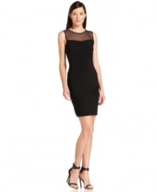 With a high beaded neckline and curve-hugging fit, Calvin Klein's dress is both sophisticated and smoldering.