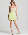 A neutral bodice offsets a hyper-bright skirt on this revel-ready Laugh Cry Repeat strapless dress.