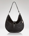 Equal parts lived-in and luxe, this leather hobo from Frye encapsulates the heritage brand's boundless, boho aesthetic.