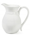 Gently scalloped edges in hardy stoneware give the French Countryside pitcher an effortless grace that's ideal for every day. With a rich, creamy glaze to suit any setting. From Mikasa.