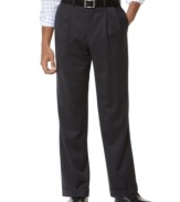 Relax in smooth, truly dapper style. This elegant navy dress pant features sophisticated double reverse pleats, on-seam side pockets, and button-through besom pockets on back. Extendable waistband. Cuffed buttoms.