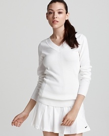 Hit the courts in Nike's sporty-chic sweater, in classic white with the distinctive swoosh.