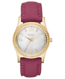 Creativity meant for the regal at heart. This colorful DKNY watch shimmers with golds and crystals.