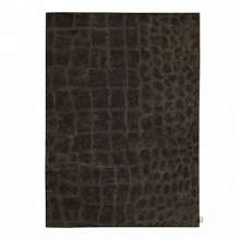 This luxurious hand-crafted Calvin Klein rug is composed of a soft luminescent pile with suede accents, creating innovative texture for the home.