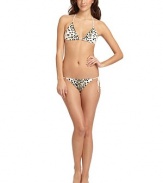 THE LOOKAllover leopard print with golden sequinsHalter straps tie at neckAdjustable padded triangle cupsBack tie closure with bead accentsTHE MATERIAL87% nylon/13% spandexFully linedCARE & ORIGINHand washImportedPlease note: Bikini bottom sold separately. 