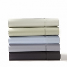 Sink into the softness of combed cotton in muted, calming hues. These classic Calvin Klein Home pillowcases feature a delicate double row cord detail.