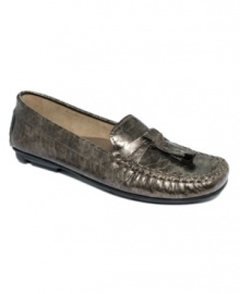 The perfect hint of sheen. Impo's Dora moccasin flats feature a shiny tassel at the vamp and subtle top-stitching.