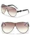 Gucci riffs on the aviator shape adding chic chain link stems. Wear them to complement sophisticated city girl style.