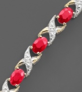 Oval-cut rubies (8 ct. t.w.) are brilliantly complemented by glittering round-cut diamonds (1/10 ct. t.w.) and set in 14k gold. Bracelet measures 7 inches.