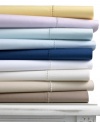 A good night's sleep starts with the pure cotton softness of this Martha Stewart Collection fitted sheet, featuring a smooth 400 thread count.