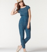 An on-trend casual look, this printed Bar III jumpsuit features a buttoned envelope-style back for an unexpected element!