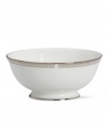 Metropolitan sensibility and modern design combine in this understated white bone china fruit bowl from Lenox's collection of dinnerware and dishes. Platinum gild along the edge is enhanced by a clean, platinum geometric pattern reminiscent of architectural accents. Qualifies for Rebate