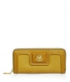 Retro-futurism at its finest, this mustard-hued wallet from Marc by Marc Jacobs will lend a stylish jolt to the everyday - Seaming details, zip around closure, front turn-lock closure with logo, internal zip pocket and room for cash, credit cards, and IDs - Perfect for daily use or as a thoughtful gift