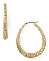 Tap into this season's textured trend with this pair of gold-plated hoop earrings from Carolee, accented by subtle, snakeskin-effect detailing.