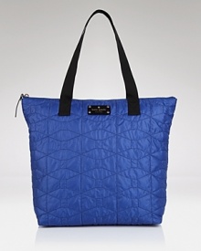 Bold style can be a beautiful thing - just check out this textured tote bag from kate spade new york which flaunts a day-right shape and endless versatility.