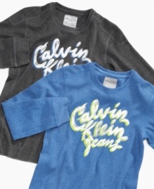 School his style with the throwback look of this thermal tee from Calvin Klein, the perfect look for a cool fall day.